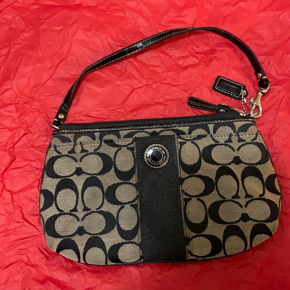 Authentic coach clutch